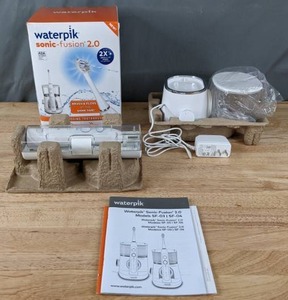 lot 142 image: Waterpik Sonic-Fusion 2.0 Flossing Toothbrush