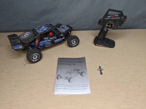 lot 57 image: CIS 112-Scale Remote-Controlled Rock Climber Racing Truck with 40mph Top Speed