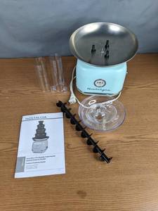 lot 103 image: Nostalgia Classic Retro 4-Tier 2-Lb. Chocolate Fondue Fountain - Blue