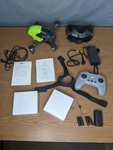 lot 53 image: DJI FPV Drone Fly More Kit