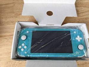 lot 7 image: Nintendo Switch Lite System - Turquoise