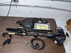 lot 282 image: Poulan Pro 8 Gas Pole Saw with Curved String Trimmer Attachment