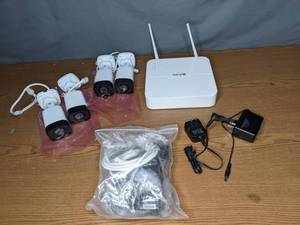 lot 352 image: REVO America Ultra 1TB NVR Surveillance System with 4 Full HD Wi-Fi Bullet Cameras