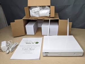 lot 324 image: Revo 4-Channel NVR 1TB Surveillance System with 4 Full HD Wireless Bullet Cameras