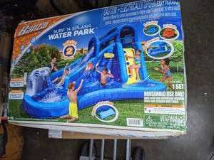 lot 487 image: Banzai Surf N Splash Inflatable Water Park with Slide with Basketball Hoop