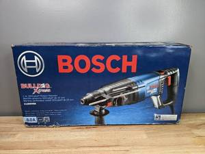 lot 1 image: Brand New Bosch Bulldog Xtreme 8 Amp 1 in. Corded Variable Speed SDS-Plus ConcreteMasonry Rotary Hammer Drill with Carrying Case T