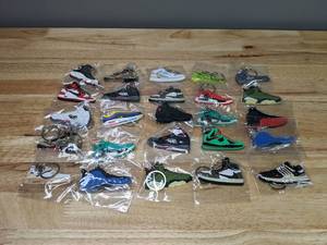 lot 26 image: Collection of 25 Brand New Nike and Jordan and Adidas Shoe Sneaker Keychains Retro Air Max Yeezy Foamposite T