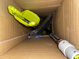 lot 56 image: RYOBI 40V 10 in. Cordless Battery Pole Saw with 2.0 Ah Battery and Charger