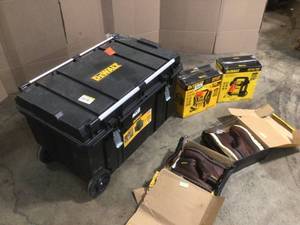 Lot of Assorted Dewalt Items include tool box, Jumper And Shoes Customer Returns See Pictures