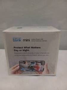 lot 10 image: BLINK MINI INDOOR PLUG IN HD SMART SECURITY CAMERA