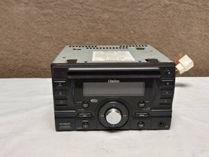 lot 90 image: CLARION CD PLAYERRADIO AND AMP BATTERY