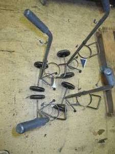 lot 4 image: 4 oxygen tank holders on wheels ...
