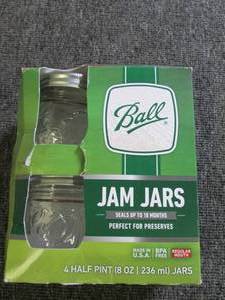 lot 21 image: 4 ball jam jars with lids and rings...