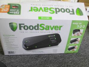 lot 73 image: foodsaver VS110 powers on...