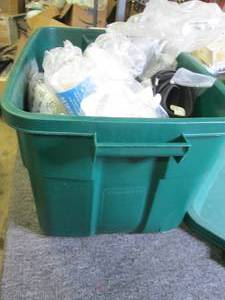 lot 121 image: green tote with compression items ,...
