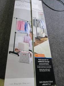 lot 136 image: 2 garment racks ...
