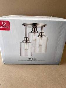 lot 35 image: Globe Electric Annecy 3-Light Brushed Steel Semi-Flush Mount Ceiling Light with Clear Glass Shades