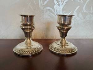 lot 133 image: Weighted Sterling silver candlesticks