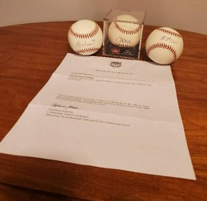 lot 270 image: Justin Morneau, Kevin Youkilis And Hank Blalock Signed Balls. Includes Letter Of Authenticity From Twins Fest Memorabilia Auction