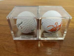 lot 390 image: Two Signed Golf balls