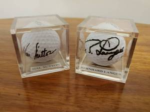 lot 394 image: Two Signed Golf balls