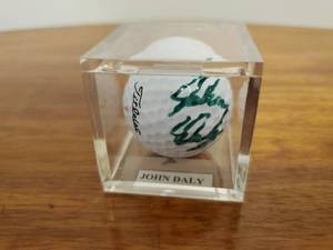 lot 397 image: John Daly Signed Golf ball