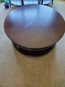 lot 223 image: Round rolling coffee table