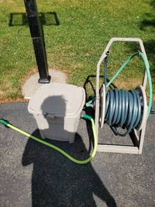 lot 240 image: 2 Suncast hose-caddies w hoses