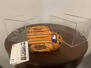 lot 92 image: Kirby Puckett Signed Mini Baseball Glove