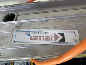lot 800 image: Aluminum Keller Extension Ladder and brace