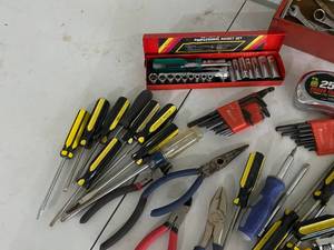 lot 91 image: Red Metal Tool Caddy with assorted wrenches, screwdrivers and sockets