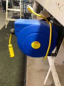 lot 190 image: Extension Cord on Reel with Mounting Bracket