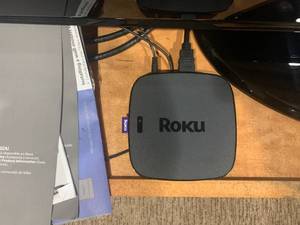 lot 25 image: TV with Roku and Soundbar