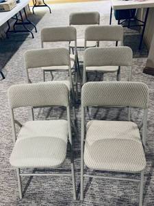 lot 109 image: Seven Beige and Ivory Diamond Pattern Folding Chairs