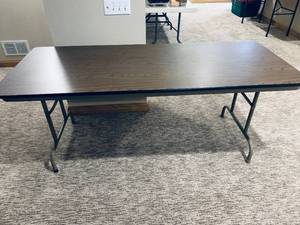 lot 110 image: Folding Tan and Woodgrain Utility Table