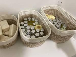 lot 325 image: Guest Toiletries with Bins and Towels