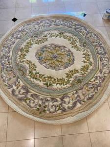 lot 357 image: Round Handwoven Wool Oriental Rug