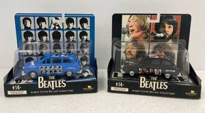 lot 15 image: Pair Of Vintage Diecast Beatles Cars