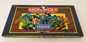 lot 37 image: Justice League America Monoploy Game And DC Comic