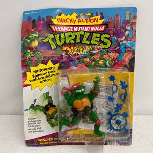 lot 39 image: 1989 TMNT Breakfightin Raphael On Original Card