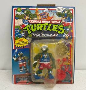 lot 42 image: 1992 TMNT Track N Field Leo On Original Card