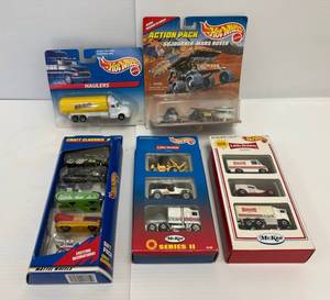 lot 124 image: Group Of HotWheels Including Little Debbie, Milk Duds And More