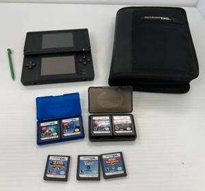 lot 140 image: Nintendo DS Lite With Case And 7 Games Including Lego Harry Potter, My Sims Kingdom, Petz Cats 2 And Zoo Hospital (All Works)