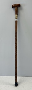 lot 78 image: Michael Vignoles Irish Walking Stick Carved Wooden Cane With Flute Inside ( Made In Galway Ireland)