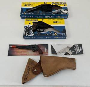 lot 183 image: Vintage Group Of Cap guns Die Cast Metal Some NIB And More