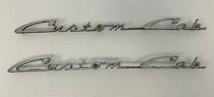 lot 197 image: Vintage Ford Custom Cab Truck Badge Emblems