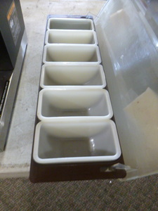 lot 18 image: 6 Compartment Condiment Bar Rail Holder