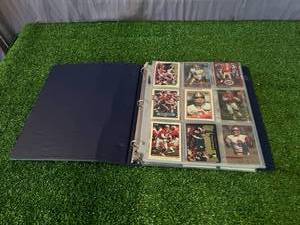 lot 63 image: Binder of Football Cards