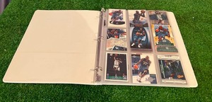 lot 76 image: Binder of Kevin Garnett Cards
