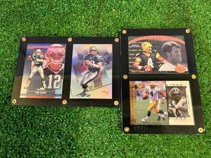 lot 85 image: Tom Brady & Brett Favre Cards